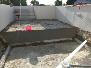 On coule les côtés du grand bain
