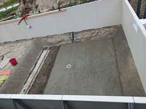 On coule le fond du grand bain